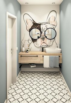 a bathroom with a dog's face painted on the wall next to a sink