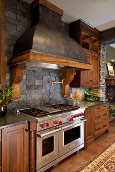 a stove top oven sitting inside of a kitchen next to a wooden cabinet and counter