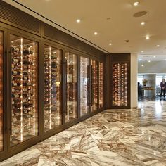 a wine cellar filled with lots of bottles