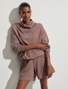 An elevated alternative to the classic sweat in our signature DoubleSoft��™️ fabric, Betsy is your oversized wardrobe staple. With an elegant cowl neck and contemporary panel detailing, the Betsy sweatshirt comes in our soft and lightweight DoubleSoft™️ fabric, ensuring all-day comfort. The versatile draw cord at the hem allows for customizable styling, making it a perfect addition to any wardrobe. Style #VAR00979 The Betsy is cut for an oversized fit. Take your true size. Our models wear a size S Vogue Home, Face Sweating, Funnel Neck Sweatshirt, Cowl Neck Sweatshirt, Timeless Wardrobe Staples, Pink Sweatshirt, Sweatshirt Designs, Barley, Black Charcoal