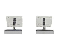 Pair of Cartier Tank Francaise cufflinks in 18k white gold, with approx. 0.54ctw G/VS diamonds. Come with box and service paper. DESIGNER: Cartier MATERIAL: 18k Gold GEMSTONES: Diamond DIMENSIONS: Cufflink top is 14mm x 13mm. MARKED/TESTED: Cartier, 750, OA2***. WEIGHT: 21.2 grams CONDITION: Previously Owned/Excellent Condition Luxury Silver Diamond Cufflinks, Luxury Silver Rectangular Cufflinks, Silver Diamond Cufflinks For Business, Silver Diamond Cufflinks For Anniversary, Silver Designer Cufflinks For Business, Classic White Gold Diamond Cufflinks, Luxury White Gold Cufflinks For Wedding, White Gold Cufflinks For Anniversary, Designer Polished Cufflinks For Business