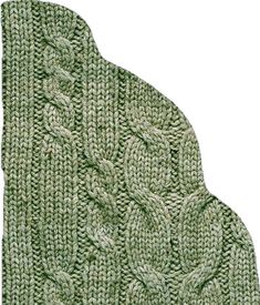 a green knitted scarf with leaves on it