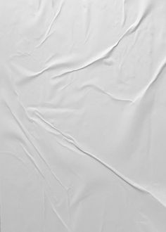 an image of white sheets that are wrinkled on the bed sheeting and pillow cases