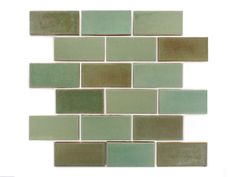 a green and brown mosaic tile wall