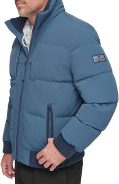 Stretch fabric and a quilted body mean all-day comfort in a versatile jacket. 27" length Stand collar Water-resistant Lined, with 50% down, 50% feather fill 88% nylon, 12% spandex Machine wash, tumble dry Imported Weatherproof Down Puffer Jacket With Long Sleeves, Functional Down Quilted Jacket For Cold Weather, Casual Quilted Outerwear In Recycled Polyester, Weatherproof Nylon Quilted Jacket For Cold Weather, Casual Quilted Outerwear From Recycled Polyester, Long Sleeve Quilted Down Jacket For Outdoor Activities, Long Sleeve Down Quilted Jacket For Outdoor Activities, Quilted Long Sleeve Puffer Jacket In Recycled Polyester, Quilted Puffer Jacket With Long Sleeves In Recycled Polyester