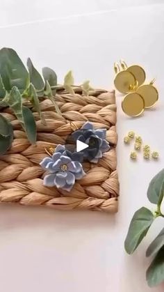 the video shows how to make paper flowers and place them on top of each other