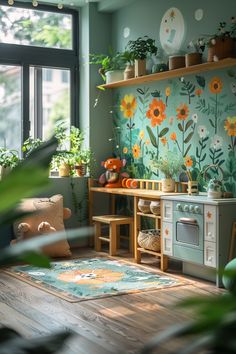 a room with green walls and flowers on the wall, potted plants next to an oven