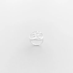 Express your connection to the universe and your spiritual practice with this timeless Ohm Ring. Crafted from sterling silver, this delicate piece features an ohm symbol and is perfect for everyday wear. Silver Symbolic Midi Rings, Sterling Silver Spiritual Toe Midi Rings, Ohm Ring, Ohm Symbol, Spiritual Practices, Everyday Wear, Universe, Spirituality, Sterling Silver