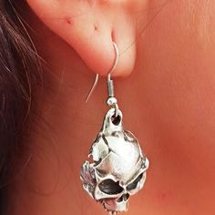 Introducing our Silver Skull Earrings: A daring blend of style and edge. Dangle or hoop they add a touch of mystique to any outfit. Stand out with these unique accessories.• Material: High-Quality Solid 925 Sterling Silver• Finish: Sterling Silver Rose Gold or Gold• A special piece you'll treasure• High-quality materials and attention to detail• Our jewelry is designed With 🖤️ In NY Silver Cleaner, Earrings Hoops, Unique Accessories, Skull Earrings, Metal Music, Silver Gifts, Earrings Dangle, Silver Rose Gold, Accessories Unique