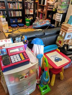 a room filled with lots of toys and clutter