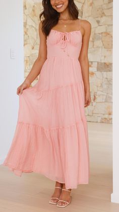 This elegant pink maxi dress features a relaxed fit with thin adjustable straps and a stylish tie detail on the bust. The shirred back panel and tiered skirt add a touch of sophistication Cheap Pink Dresses, Pink Dresses, Pink Maxi, Pink Maxi Dress, Daily Dress, Lovely Dresses, Tiered Skirt, Relaxed Style, Gold Details