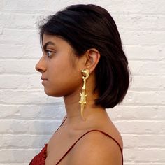 These unique earrings are the perfect accessory for anyone who loves to make a statement with their style. Each earring is expertly crafted with attention to detail, from the intricate scales of the alligator to the realistic texture of the fish. The combination of the two creates a striking and unforgettable design that truly stands out. The hypoallergenic hooks are comfortable for all-day wear, and the lightweight design will not weigh you down. 🌸 〰️〰️〰️ 🌸 〰️〰️〰️ 🌸 Care and CompositionMater Elegant Hand Cast Drop Earrings, Elegant Hand Cast Brass Earrings, Elegant Hand Cast Metal Earrings, Elegant Hand Cast Jewelry For Parties, Women Artisans, The Fish, Unique Earrings, The Two, Cloth Bags