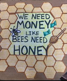 a sign that says we need money like bees need honey