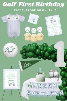 an image of a birthday party with green balloons and items for the baby's first birthday