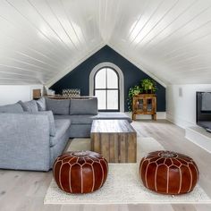 a living room with two couches and a coffee table