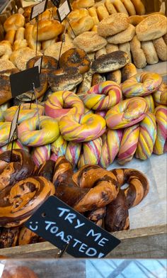 there are many different types of donuts on display