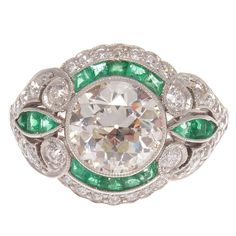 Vintage Art-Deco Ring* 2.20 CT Round Cut Lab Diamond & Green Emerald Engagement* 925 Sterling Silver Ring* Bridal Gift Ring* Gift For Wife* ✱ Our priority is to ensure our customers are 100% satisfied with their purchase. All jewelry is thoroughly inspected by our professional gemologist before it ships. Photos are enlarged to show details. ✱ It is available to customized, if you have any mind, just let me know, we will discuss with it. ✱ What sets us apart? Handcrafted Made to order USA CERTIFI Green Diamond Rings, European Cut Diamond Ring, Beautiful Baubles, Vintage Art Deco Rings, Edwardian Ring, Triangle Diamond, Emerald Rings, Art Deco Diamond Rings, Vintage Diamond Rings