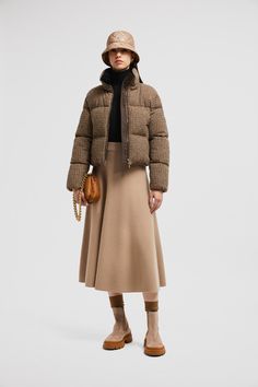 Inspired by timeless fashion, this skirt is crafted from a luxurious blend of Merino wool and cotton. Style with warm knits and refined puffers for a sophisticated winter look. Chic Winter Wool Skirt, Chic Wool Skirt For Winter, Personalized Jacket, Winter Skirt Outfit, Cotton Midi Skirt, Latest Skirts, Winter Skirt, Cardigan Shirt, Outerwear Outfit