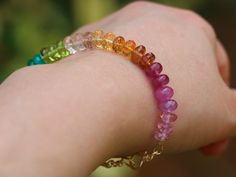 This bracelet is a colorful gemstone party on your wrist! Here I have gathered the most stunning, clear, sparkling AAA quality rondelles faceted and smooth. The precious rondelles I used are large and of extremely high quality – just look how each one glows and sparkles! Their size is between 6.8mm to 7mm, which makes [...] Precious Stones Bracelet, Bracelet Measurements, Multi Gemstone Bracelet, Rainbow Palette, Bracelet Rainbow, Colorful Bracelet, Rainbow Gemstones, Multi Sapphire, Rainbow Bracelet