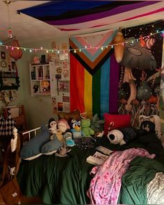 a bed room filled with lots of stuffed animals