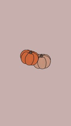 three pumpkins sitting on top of each other in front of a pink background with the word