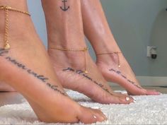 three women with tattoos on their feet and one has a cross tattoo on her foot