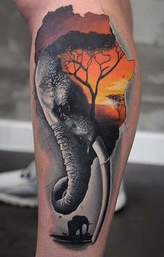 an elephant with a tree on it's head is shown in this tattoo design