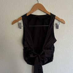 Back Ties Into Bow. Backless Top Never Worn. Nwot. Missed Return Window. No Flaws Black Tie-back Evening Top, Black Tie Back Top For Evening, Black Tie Back Top For Party, V-neck Crop Top With Tie Back For Party, Black Tie Back Top For Date Night, Black V-neck Top With Tie Back, Victorian Corset, White Halter Top, Open Back Tank