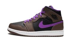 The Air Jordan 1 Mid “Palomino” is a unique colorway of the popular sneaker that features a neutral-colored design, but with a twist.  The “Palomino” is complete with a black leather base that gives way to brown leather overlays throughout.  A Wild Berry leather Swoosh appears on either side of the shoe.  The purple hue reappears on the Jumpman and “Air” branding on the tongue, on the interior of the sneaker, and on the laces.  Classic black “Wings” branding is found on the collar.  Underfoot, a Custom Made Shoes, Popular Sneakers, Black Wings, Shoe Inspo, Stadium Goods, Mens Nike Air, Kids Jordans, Wild Berry, Air Jordan 1 Mid