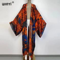 Kimono Kaftan Boho Soft Cardigan  Batwing Sleeve  Brand Name : winyi    Material : Rayon    Pattern Type : Print    Style : Young Style    Young Style : Bohemian    Age : 25-34    Fit : Fits larger than usual. Please check this store's sizing info Orange Long Sleeve Kimono For Festivals, Printed Long Kimono For Fall, One Size Printed Kimono For Fall, Printed One-size Kimono For Fall, Multicolor Wrap Kimono For Fall, Fall Printed Wrap Kimono, Free Size Fall Kimono With Kimono Sleeves, Free Size Long Sleeve Fall Kimono, Stitch Cocktail