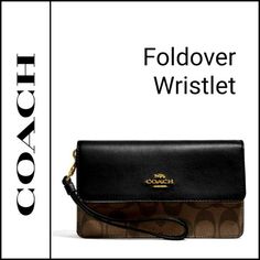 Authentic Coach Brown/Black Foldover Wristlet (F78229) With Gold Hardware. - Signature Coated Canvas & Smooth Leather - One Credit Card Slot - Snap Closure - Fabric Lining - Outside Zip Pocket - Detachable Wrist Strap - 7" X 4" X 1.75" *Removed From Packaging For Photos Only Elegant Brown Leather Wristlet, Classic Leather Wristlet For Formal Occasions, Elegant Brown Wristlet For Evening, Elegant Brown Evening Wristlet, Coach Brown Wristlet For Formal Occasions, Brown Coach Wristlet For Formal Occasions, Formal Brown Coach Wristlet, Classic Coach Wristlet For Formal Occasions, Formal Brown Wristlet With Wrist Strap