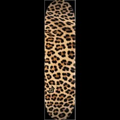 a skateboard with an animal print on it