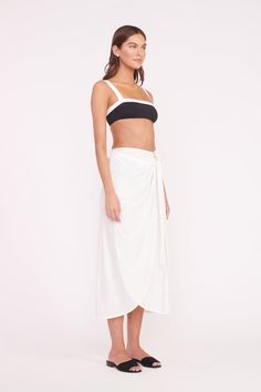 The Angelica coverup skirt is a maxi draped skirt in white mesh, that ties on the hip. This skirt is meant to be worn as a swim coverup that pairs back to our swim collection for the beach and beyond. Flip Flops Style, Beachwear Fashion, Coverup Skirt, Swim Coverup, Draped Skirt, Cut Out Swimsuits, Swim Skirt, Skirt White, White Mesh