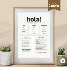 a poster with the words hola on it next to a plant and potted succulent