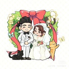 a couple standing next to each other in front of a cat and flower frame with a red ribbon on it