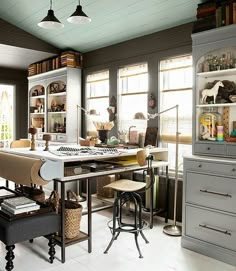 the kitchen is clean and ready to be used as a dining room or study area