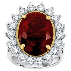 This one-of-a-kind ring features a rare un-heated natural 9.67 carat Red Ruby oval shape circled by eighteen (18) brilliant round diamonds and two rows of round diamond micro-prong set on a split shank band. The Ruby is deep red color and has some inclusions that blend nicely throughout the gem. The band is 2.8 mm wide. The Ruby is GIA certified. Certificate number 5211628195 The diamond's weight on the ring is 2.26 Carat. Average color G Average clarity SI1 size- 6.5 It can be resized to any fi African Inspired Jewelry, Royal Ruby, Ruby Jewel, Real Diamond Necklace, Beautiful Tiaras, African Jewelry, Minerals And Gemstones, Split Shank, Red Ruby