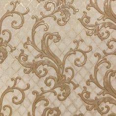 a close up view of a wallpaper with gold swirls and scrolls on it