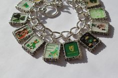 St. Patricks Day altered art bracelet. Fourteen vintage altered art St. Patricks Day pictures. Made when you order with a non yellowing resin. The curb style chain is 7 1/2 inches long, but I can make it longer or shorter to suit your needs. It takes at least 5 days to make the charms and your bracelet will be shipped to you as soon as it is ready. St Patricks Day Pictures, Art Altéré, Bracelet Art, Erin Go Bragh, Art Bracelet, Day Pictures, Luck Of The Irish, Saint Patrick, Cute Bracelets