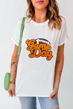 This Orange Cursive Game Day Tee is perfect for showing off your team spirit at the next game! Made with high-quality materials, it is comfortable and durable for all-day wear. The bold orange cursive design adds a stylish touch to your game day outfit. Get ready to cheer on your team in style with this tee! Model Info: Models are 5'7", Size 2, wearing smalls Material: 62% Polyester + 32% Cotton + 6% Elastane Size Chart (INCH) Sizes Bust Hem_Width Shoulder Sleeve_Length Length Relax Relax Relax Cursive Design, Football Pattern, Simply White, Gameday Outfit, Trendy Tshirts, Sporty Look, Sporty Style, Team Spirit, Game Day