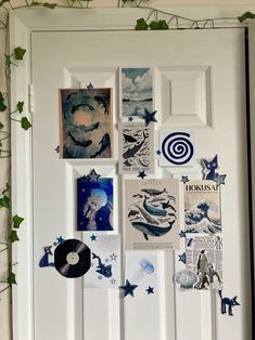 a white door covered in pictures and magnets