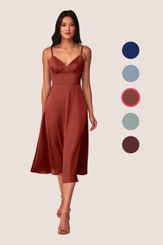 Your leading ladies will look feminine and elegant while wearing our Dottie dress. Made from stretch satin, this bridesmaid dress features a spaghetti strapped V-neckline bodice with a midi length A-line skirt. Delicate self covered buttons at the back add a nice finishing touch. Terracotta Outfit, Party Outfit Formal, Dusty Blue Dress, Rust Bridesmaid Dress, Tea Length Bridesmaid Dresses, Stretch Satin Dress, Azazie Bridesmaid Dresses, Satin Bridesmaid Dresses, Rust Dress