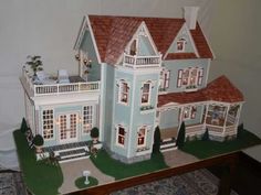 a large doll house on top of a table