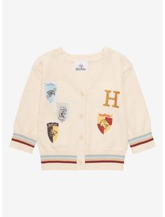 a cardigan sweater with patches on the front and sleeves, featuring hogwart's crests