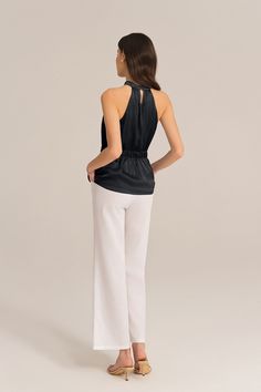 Add a touch of edgy sophistication to your wardrobe with this halterneck tops. The cut-out shoulder design and the keyhole back adds a touch of elegance and trendy. The elastic waist ensures a comfortable and flattering fit. Perfect for both casual and dressy occasions, these tops will elevate your style.Material : 98%Polyester+2%ViscoseElasticity : NoneSku : CLD027S24*Package : 1*TopsCare instructions:Do Not Bleach.Separate dark colors.Iron Low Heat. Halterneck Tops, Bodycon Floral Dress, Halter Neck Top, Vacation Dresses, Shoulder Design, Long Sleeve Midi Dress, Blouse Dress, Elevate Your Style, Guest Dresses