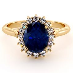 A classic design featuring a stunning blue sapphire center stone that rests on a high quality setting made of 14K yellow gold. This 14K yellow gold diana ring was crafted to perfection and made to last a lifetime. 💗 **NEW** Live Chat With Us 💬 💗 http://bit.do/Camellia-Jewelry SETTING #SKU: AY-0010E Metal: 14K Yellow Gold (Also Available in 14K Rose Gold or 14K White Gold - No Extra Charge) Ring Size: 6.5 Size Selectable (4-9 US Sizes) Certificate: AJC (Ayala Jewelry Certificate) MAIN STONE Ty Luxury Sapphire Oval Halo Ring, Luxury Oval Sapphire Halo Ring, Luxury Sapphire Oval Rings, Elegant Sapphire Ring With Oval Cabochon, Luxury Oval Halo Ring With Accent Stones, Elegant Sapphire Oval Cabochon Rings, Luxury Gold Sapphire Ring With Halo, Gold Sapphire Diamond Ring With Halo Design, Luxury Oval Sapphire Ring For Anniversary