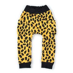 a yellow and black animal print pants