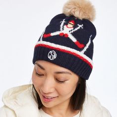 With a soft faux fur pom pom, these knitted hats are the perfect accessory to keep you warm all winter long. Add an embroidered monogram for an easy, yet thoughtful holiday gift.  18-24" circumference x 12"h; faux fur pom pom: 3"  85% acrylic, 15% wool.  Hand wash cold, lay flat to dry, warm iron as needed.  Imported.  Monogramming is embroidered. Monogram Maker, Knit Pom Pom Hat, Fur Pom Pom Hat, Personalized Bags, Holiday Hats, Mark And Graham, Embroidered Monogram, Faux Fur Pom Pom, Gift Finder