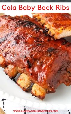 two ribs covered in bbq sauce on a white plate with text overlay that reads, how to cook baby back ribs