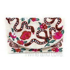 "SAME DAY SHIPPING!! You'll love these gorgeous beaded clutch - buy for yourself or/and give as the perfect gift. Made using colored beads. It can be use as a clutch or cross body bag. Magnetic closure One inside slip pocket Canvas lining Dimension: 10\" wide x 7\" tall Great for Personalized Gifts, Bridal Shower Gifts, Birthday Gifts, Mother's Day gifts, Gift for Her, Bride to be Gift, Engagement Gift, Bachelorette Gift, Christmas Gifts \"For more styles, visit our Handbags/Purses section\" htt Bridal Accessories Earrings, Beaded Clutch Purse, Bridal Handbags, Floral Clutches, Party Clutch, Snake Patterns, Velvet Headband, Beaded Bag, Beaded Handbag